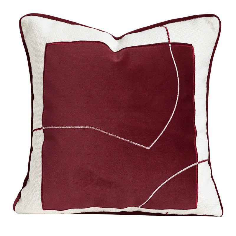 Housse de Coussin Rouge Ligne de Vie moderne et minimaliste avec une partie centrale bordeaux et une bordure blanche - de face