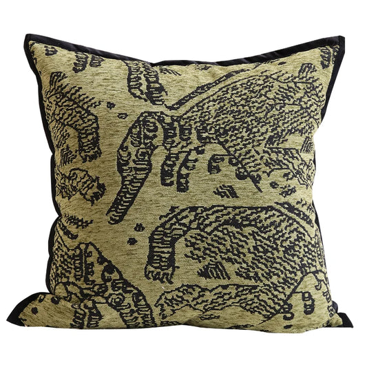 Housse Coussin Vert Noir décoratif avec un motif animalier noir sur un fond vert, bordures noires, texture tissée - de face